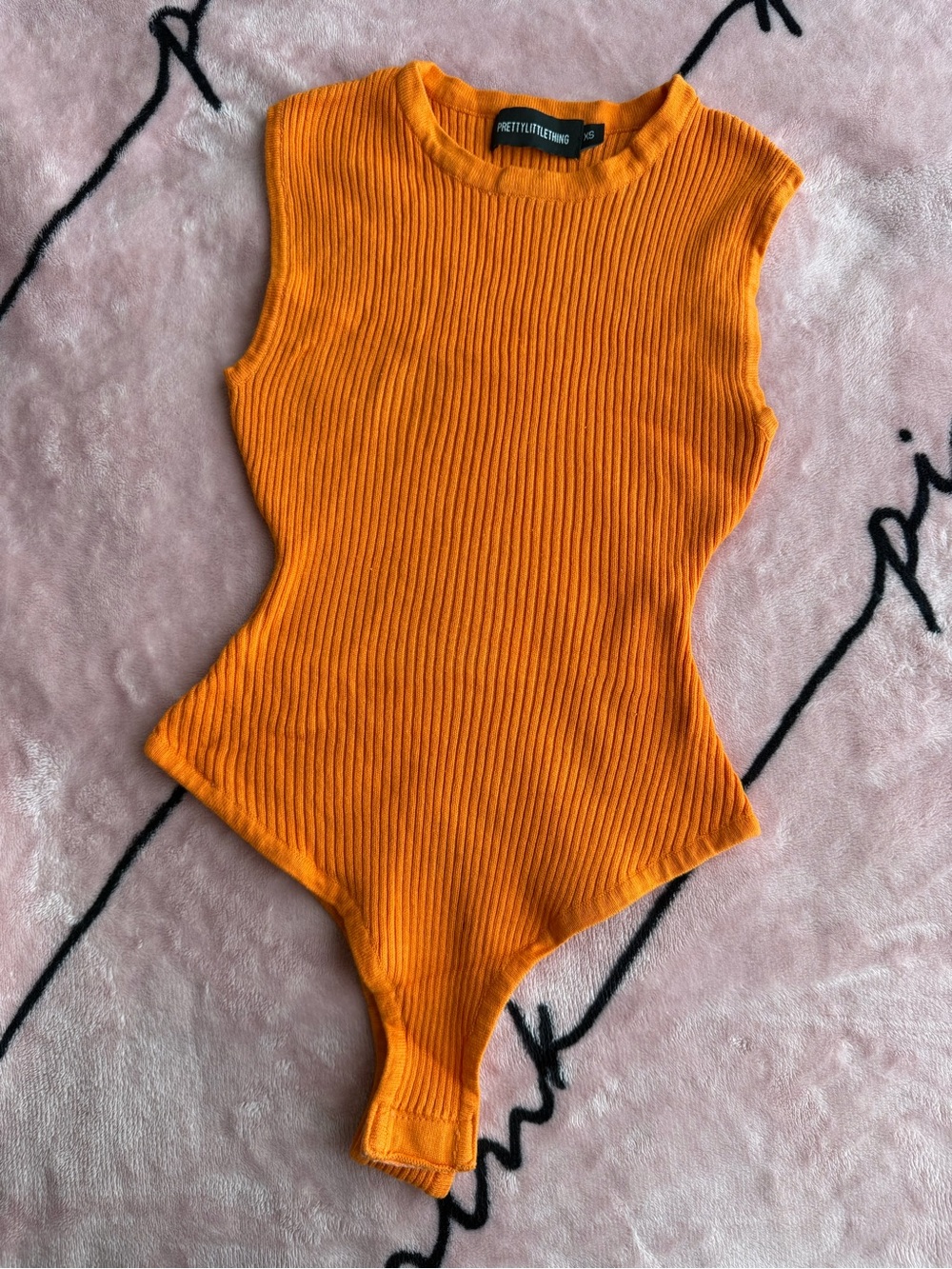 PrettyLittleThing orange ribbed knit bodysuit
